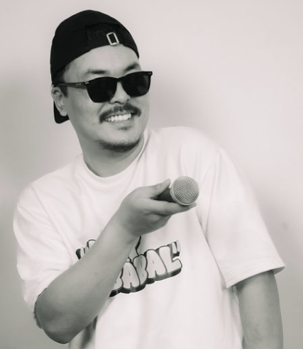 Sujan Zimba energetically performing live stand-up comedy in Kathmandu